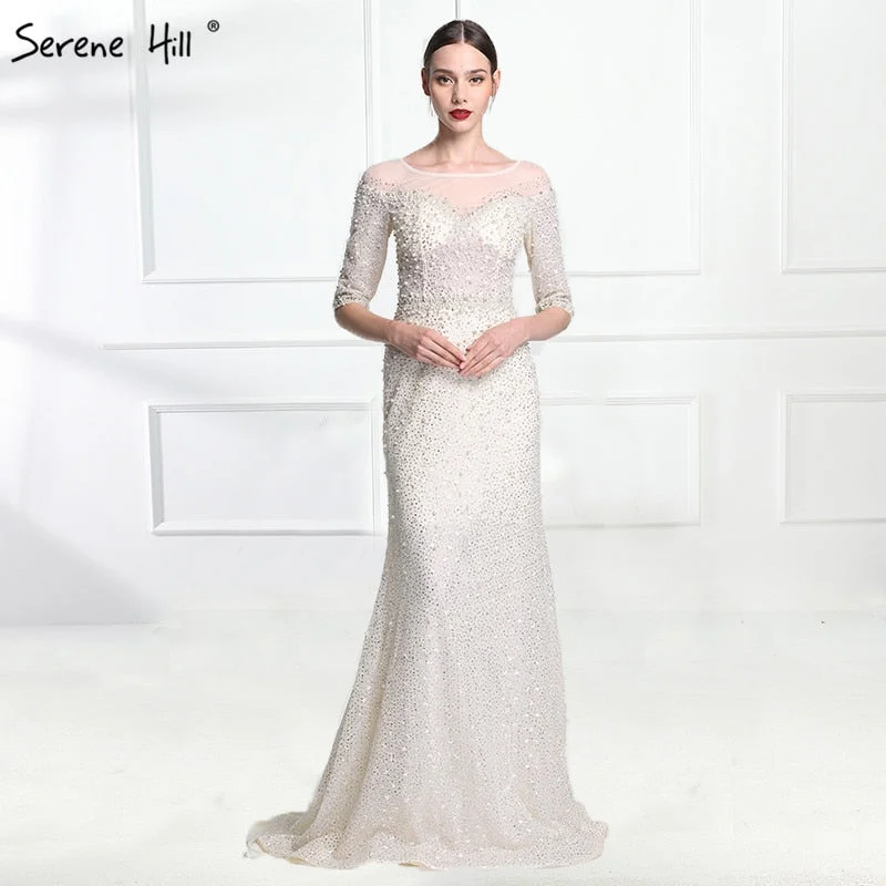 Evening dress with high neckline-Ivory Half Sleeve Mermaid Evening Gowns Luxury Crystal Pearls Tulle Elegant LA6140