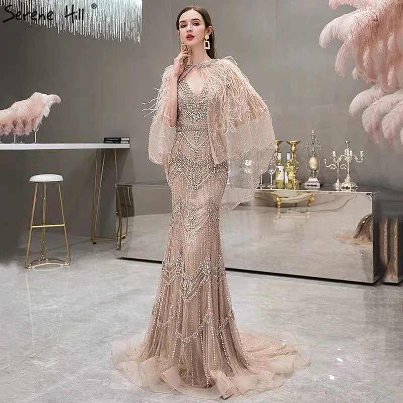 Evening dress with sleeves-Luxury Nude V-Neck Mermaid Evening Dresses 2024 Sleeveless Shawl Yarn Feathers Sexy Formal Dress Serene Hill LA70171